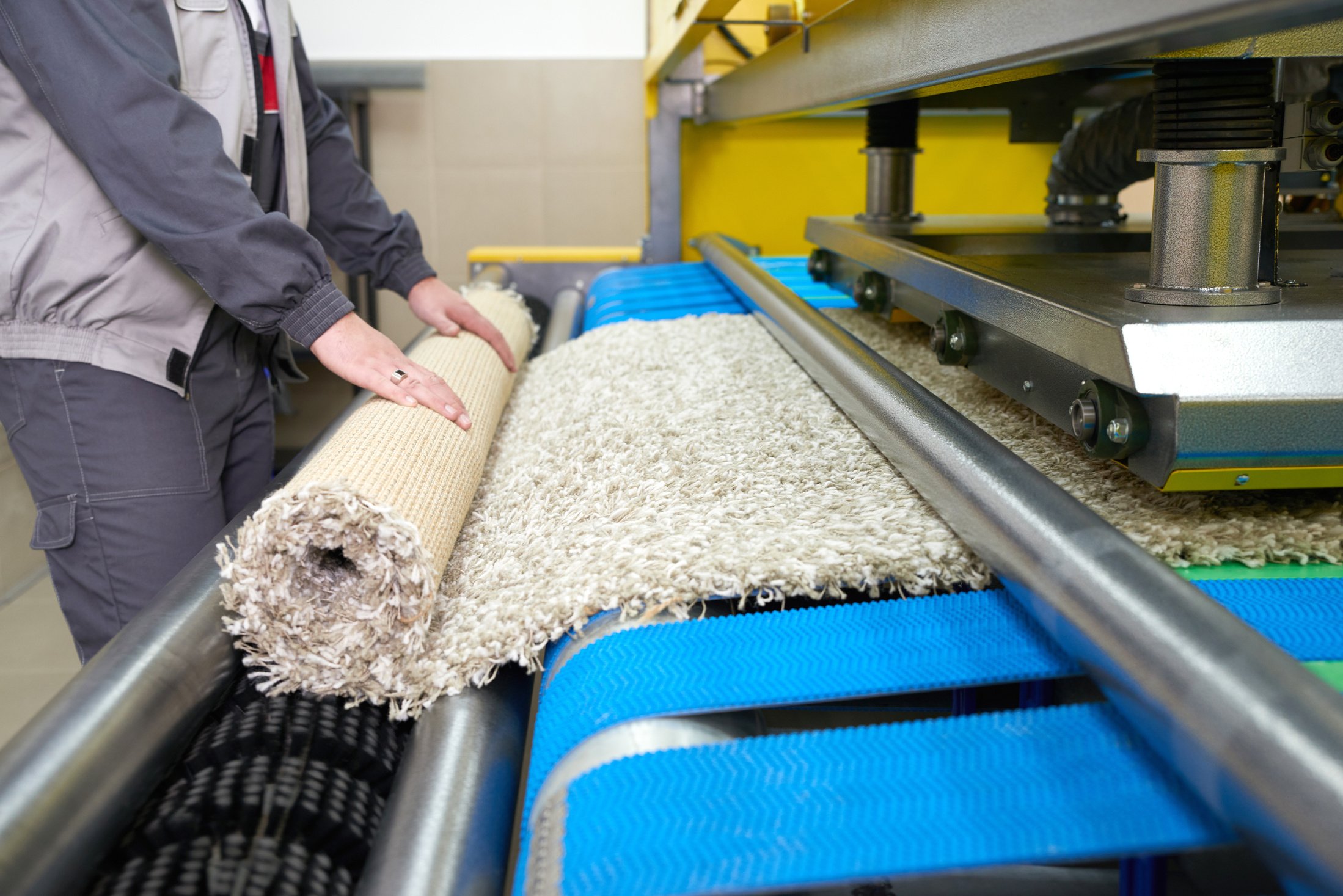 Laundry Worker in the Process of Working on Automatic Machine for Carpet Washing in Dry Cleaning